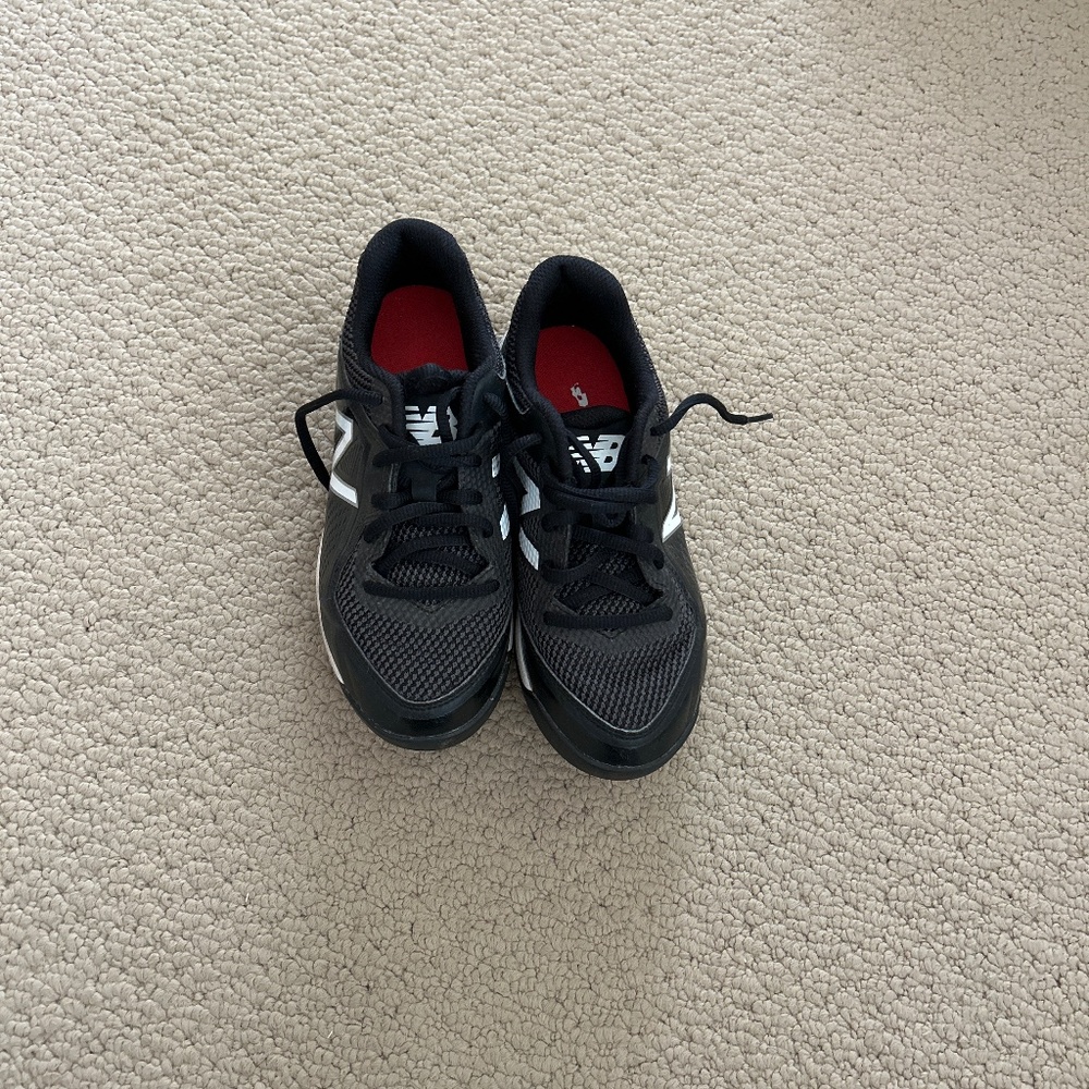 New balance cleats , football? Baseball?, 1 1/2 youth wide width